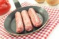 Salsiccia in a pan on napkin Royalty Free Stock Photo
