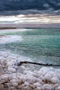 Salt beach of the Dead Sea at sunset, Jordan Royalty Free Stock Photo