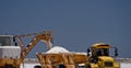 Salt being collected in Walvis Bay, Namibia Royalty Free Stock Photo