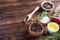 Salt, black seed pepper, branch of rosemary, red hot chili Royalty Free Stock Photo