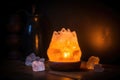 salt crystal lamp glowing in a dark room