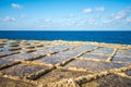 Salt evaporation ponds on Gozo island, Malta Royalty Free Stock Photo