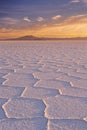 Salt flat Salar de Uyuni in Bolivia at sunrise