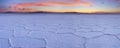 Salt flat Salar de Uyuni in Bolivia at sunrise