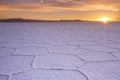 Salt flat Salar de Uyuni in Bolivia at sunrise Royalty Free Stock Photo