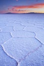 Salt flat Salar de Uyuni in Bolivia at sunrise