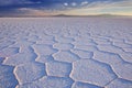 Salt flat Salar de Uyuni in Bolivia at sunrise Royalty Free Stock Photo