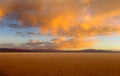 Salt flat of Salar Uyuni salt lake at sunset Royalty Free Stock Photo