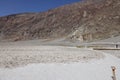 Salt flats, lined by mountains, at Badwater Basin in Death Valley National Park, California Royalty Free Stock Photo