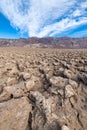 Salt formations under a blue sky at the Devil`s Golf Course in Death Valley National Park, California, USA Royalty Free Stock Photo