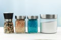 Salt in glass jars, different types of salt