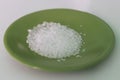 Salt in a green dish Royalty Free Stock Photo