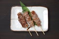 Salt grilled beef skewers on a dining table Royalty Free Stock Photo