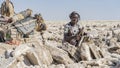 Salt miner working in the salt plains in the Danakil Depression in Ethiopia during winter season.