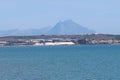 Salt mountain on the coast with the Puig Campana mountain in the background. Santa Pola, Alicante, Spain