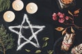 Salt pentagram symbol on wiccan witch altar