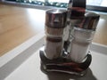 Salt  and pepper accessory on a table Royalty Free Stock Photo