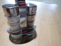 Salt  and pepper accessory on a table Royalty Free Stock Photo