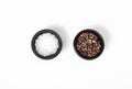 Salt and pepper in black bowl on white background Royalty Free Stock Photo