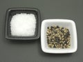 Salt and pepper on a dull matting