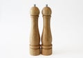 Salt and pepper mill, wooden cruet set white background full depth of field Royalty Free Stock Photo