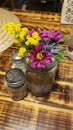 Salt and pepper shakers with Mason jar flowers dining table st augustine florida Royalty Free Stock Photo