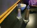 Salt and Pepper Shakers on a Table in a Cozy Diner Setting Royalty Free Stock Photo