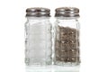 Salt and pepper shakers on white Royalty Free Stock Photo