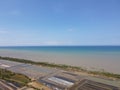 A Salt Pond with a View of the Color Gradations of the Sea in Sampang, Indonesia