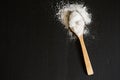 Salt powder on the back wooden background