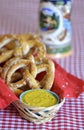 Salt Pretzels with Mustard Beer Stein on Red Checker Tablecloth