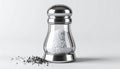 Salt Shaker on White Background with Scattered Black Peppercorns Close Up Studio Shot Royalty Free Stock Photo