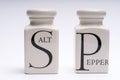 Salt shaker, white with black letter Royalty Free Stock Photo