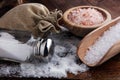 Salt Shaker and salt on wooden table