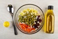 Salt, spoon, bowl with ingredients for vinaigrette, vegetable oil on wooden table. Top view Royalty Free Stock Photo