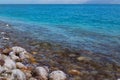 The salt on the stones, the seashore of the Dead Sea in Israel Royalty Free Stock Photo