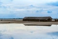 Salt storage granaries, sea salt storage in salt farms. Granary for salt storage and salt farm Solar. Abandoned old wood salt barn