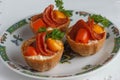 Salt tartlets with peperoni and parsley Royalty Free Stock Photo