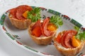 Salt tartlets with peperoni and parsley Royalty Free Stock Photo