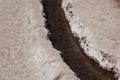 The salt terraces of Maras Cusco the snowcapped Salkantay Andes mountain peak in the background, Sacred Valley of the Inca, Royalty Free Stock Photo