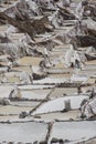 The salt terraces of Maras Cusco the snowcapped Salkantay Andes mountain peak in the background, Sacred Valley of the Inca, Royalty Free Stock Photo