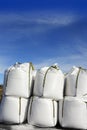 Salt white sacks rows stacked to road ice