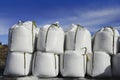 Salt white sacks rows stacked to road ice Royalty Free Stock Photo