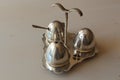 Saltcellar, pepper pot and mustard pot in pewter Royalty Free Stock Photo