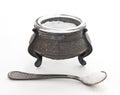 Saltcellar with spoon on white Royalty Free Stock Photo