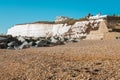 Saltdean beach seafront cliffs with weekend house in the background at East Sussex Brighton marina.