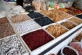 Salted and candied nuts, raisins and prunes are sold in a window at the Chorsu market in Tashkent