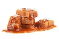 Salted caramel candies with caramel topping isolated on white background. Golden Butterscotch toffee caramels. Salted caramel Royalty Free Stock Photo