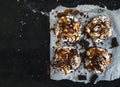 Salted caramel and chocolate meringues over dark Royalty Free Stock Photo