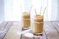 salted caramel milkshake with caramel drizzle and sea salt on rim